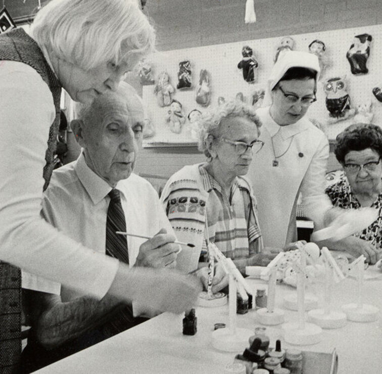 Sister Margaret Mary assisting individuals